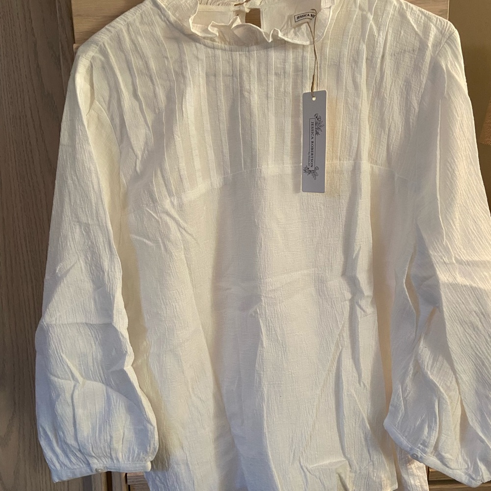 Jessica Robertson cream color sweet ruffle neck tie back elastic wrist sleeve